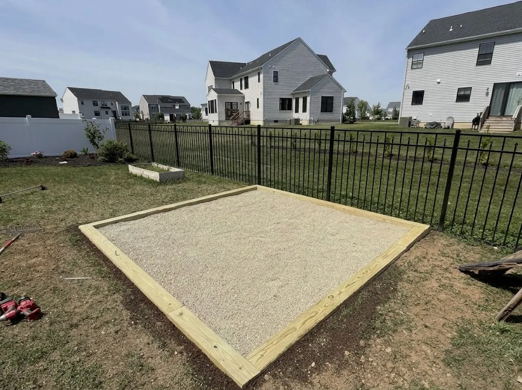 Completed timber-edged stone gathering area